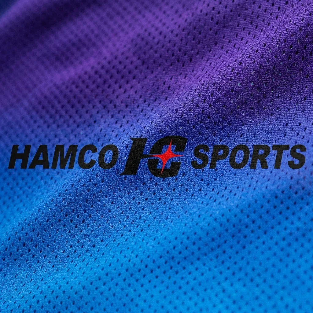 Macro detail of sublimation basketball jersey design showing a smooth color gradient on polyester fabric.
