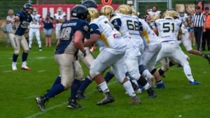 Football Players Huddle