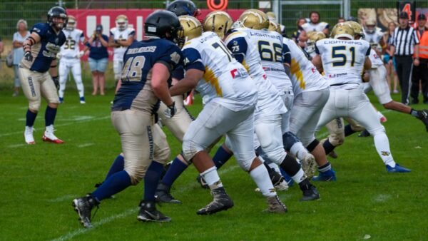 Football Players Huddle